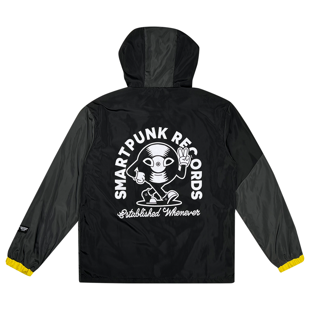 Black and grey windbreaker with yellow accents and stacked "Smartpunk" logo RONT